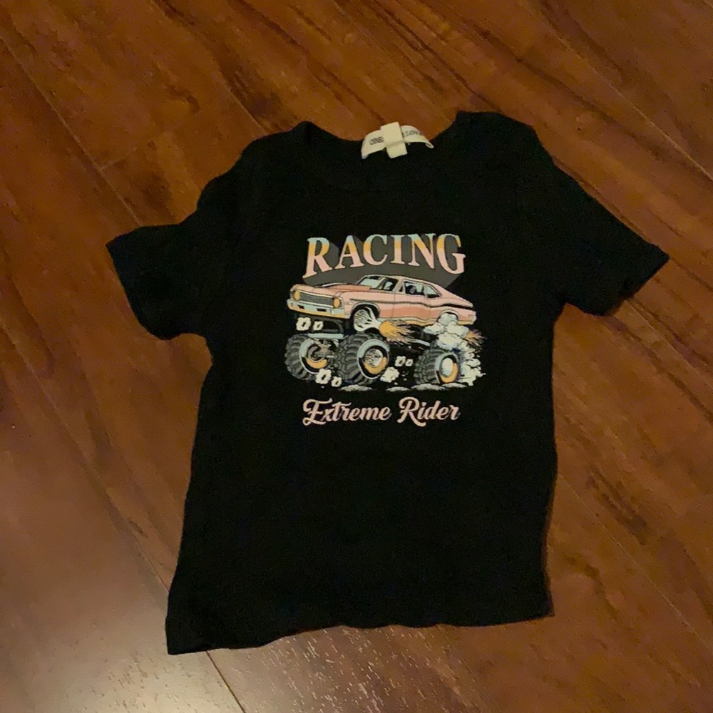 Black Obsessive Love shirt with truck design on front. XS.